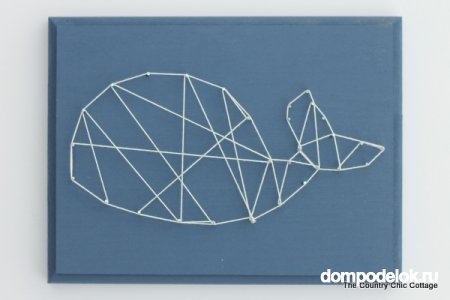 Рисунок из геометрических фигур в технике изонить на дощечке